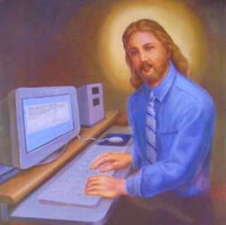 Jesus, dressed in tie and button-down shirt, types at a PC.